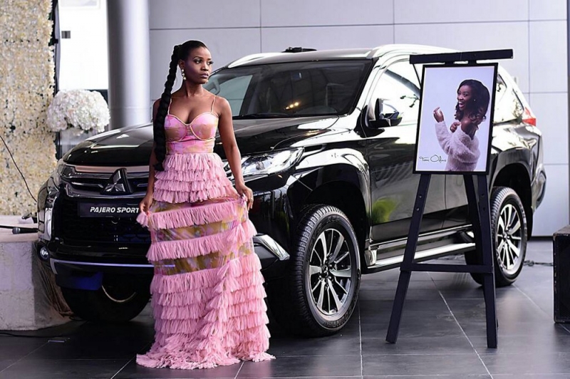 Tomi Odunsi stunning in pre-event photoshoot with the Pajero Sport